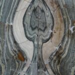 Plate of folded marble (Cipollino verde) used as wall decoration in a Roman house, Turkey